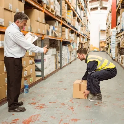 depositphotos 65535897 stock photo manager watching worker carrying boxes